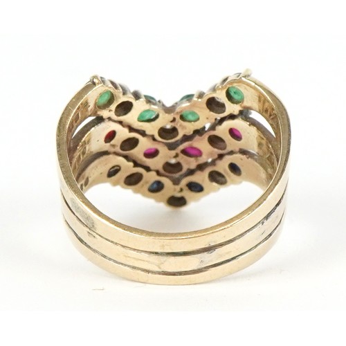 3029 - A 9ct gold multi gem triple wishbone ring set with diamonds, rubies, emeralds and spinel, size Q, 6.... 