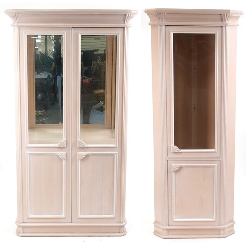 2175 - A modern suite of pink painted dining room furniture comprising a side cabinet, corner cabinet, tabl... 