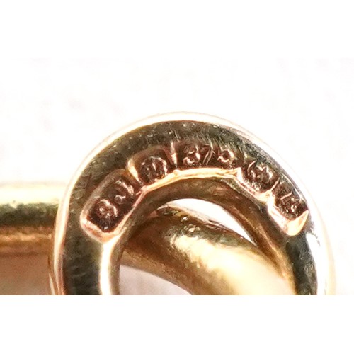 3144 - A 9ct gold Mizpah pendant on a 9K gold necklace, 1.6cm in diameter and 50cm in length, total 2.1g.