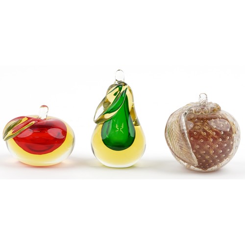 640A - Three Murano glass paperweights in the form of fruit, the largest W-10cm