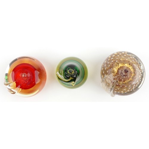 640A - Three Murano glass paperweights in the form of fruit, the largest W-10cm