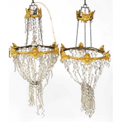 2194 - A set of four early 20th century gilt metal ceiling lights with cut glass drops, 75cm high x 36cm in... 