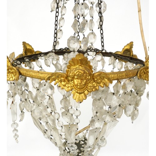 2194 - A set of four early 20th century gilt metal ceiling lights with cut glass drops, 75cm high x 36cm in... 
