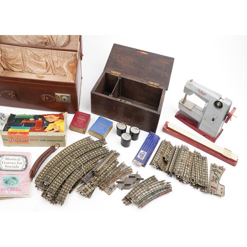 1804 - Antique and later sundry items including a travelling vanity case, card games, a child's sewing mach... 