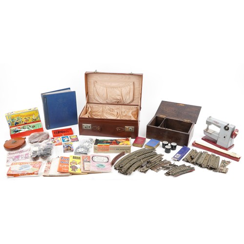 1804 - Antique and later sundry items including a travelling vanity case, card games, a child's sewing mach... 