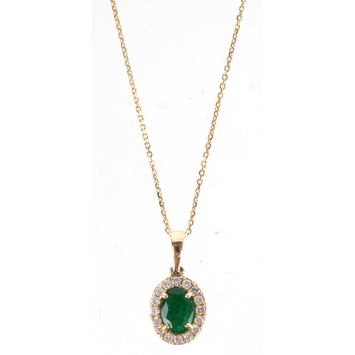 3206 - A 9K gold emerald and diamond cluster pendant on a 9K gold necklace, total diamond weight 0.19 carat... 