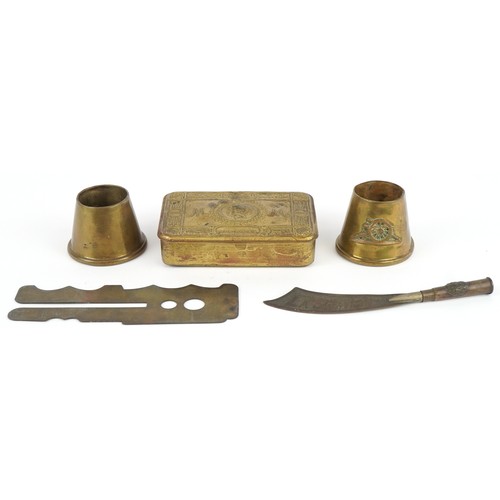 2803 - British militaria including a Christmas 1914 Mary tin, button cleaning tool and trench art, the larg... 