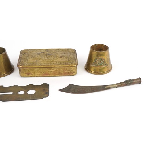 2803 - British militaria including a Christmas 1914 Mary tin, button cleaning tool and trench art, the larg... 