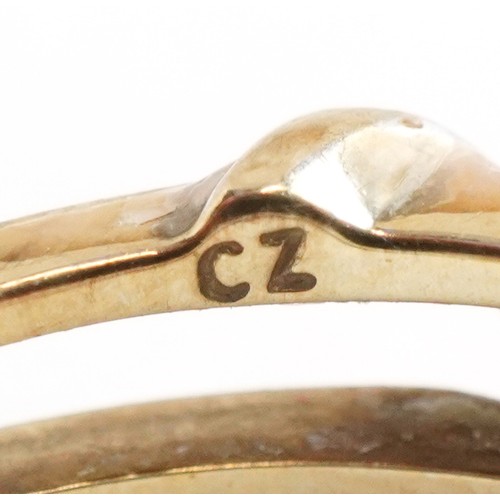 3293 - A 9ct white and yellow gold cubic zirconia and blue spinel ring with a detachable band, size N, 3.4g... 