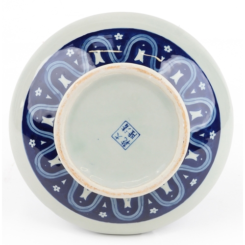 161 - A Chinese blue and white porcelain vase, hand painted with a floral border, bearing four character m... 