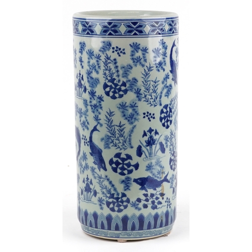 167 - A Chinese cylindrical blue and white porcelain stick stand, modern, decorated with carp, bearing fou... 