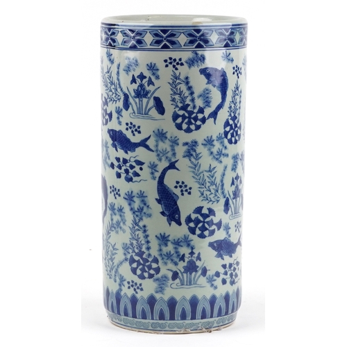 167 - A Chinese cylindrical blue and white porcelain stick stand, modern, decorated with carp, bearing fou... 