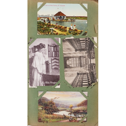 A collection of early 20th century postcards and greetings cards ...
