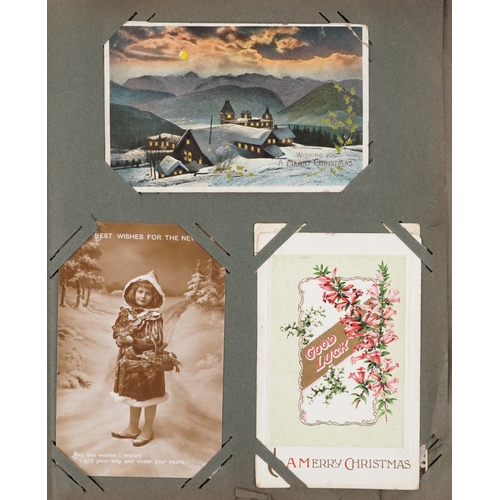 A collection of early 20th century postcards and greetings cards ...