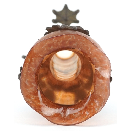  An Art Nouveau bronze and orange iridescent glass vase attributed to Loetz, the hand blown glass bow... 