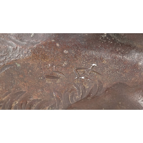  A Japanese bronze okimono figure of a tiger bearing signature to the base, 30cm in length.