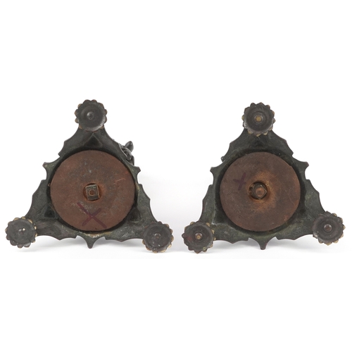 49 - A pair of 19th century bronze candelabra figural bases, each modelled as a maiden carrying a jar, ra... 