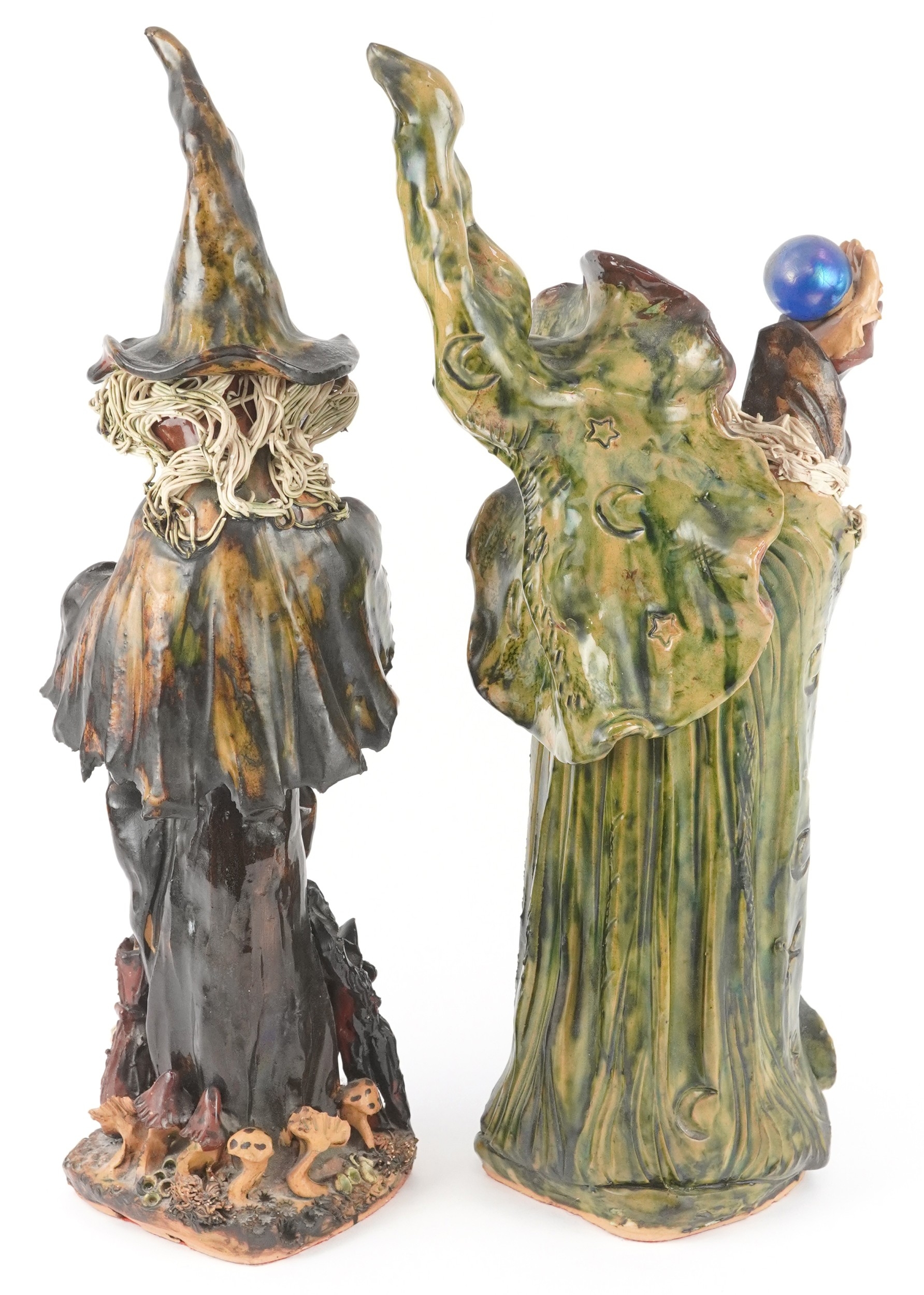 Two Studio pottery wizard and witch figures by Joy Pamphilon, each ...