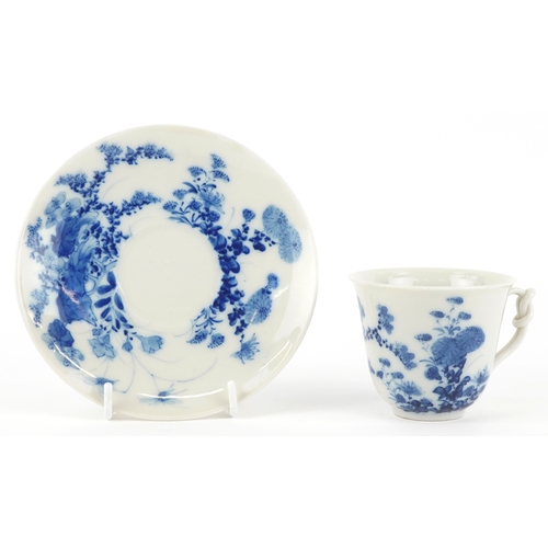 125 - A Chinese blue and white porcelain cup and saucer,six character mark to the base, 13cm in diameter.