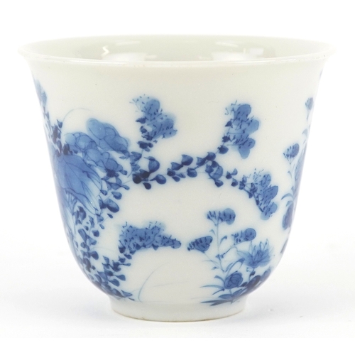 125 - A Chinese blue and white porcelain cup and saucer,six character mark to the base, 13cm in diameter.