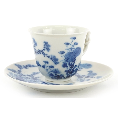 125 - A Chinese blue and white porcelain cup and saucer,six character mark to the base, 13cm in diameter.