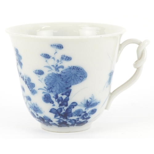 125 - A Chinese blue and white porcelain cup and saucer,six character mark to the base, 13cm in diameter.