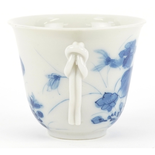 125 - A Chinese blue and white porcelain cup and saucer,six character mark to the base, 13cm in diameter.