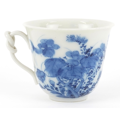 125 - A Chinese blue and white porcelain cup and saucer,six character mark to the base, 13cm in diameter.