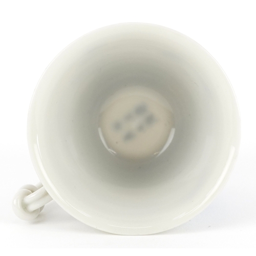 125 - A Chinese blue and white porcelain cup and saucer,six character mark to the base, 13cm in diameter.