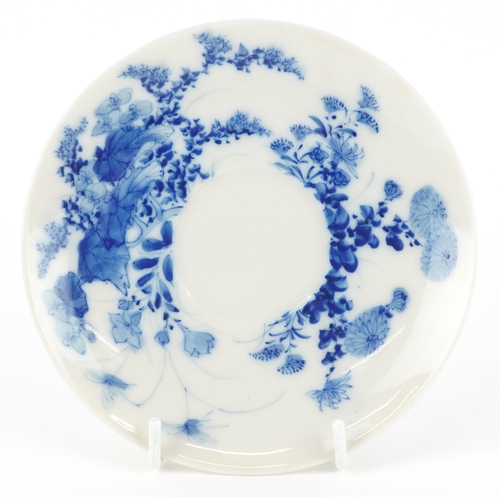 125 - A Chinese blue and white porcelain cup and saucer,six character mark to the base, 13cm in diameter.