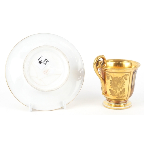  A 19th century French porcelain cabinet cup and saucer by Darte Frères with gilded and hand painted ... 