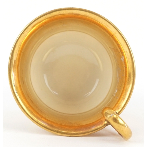  A 19th century French porcelain cabinet cup and saucer by Darte Frères with gilded and hand painted ... 