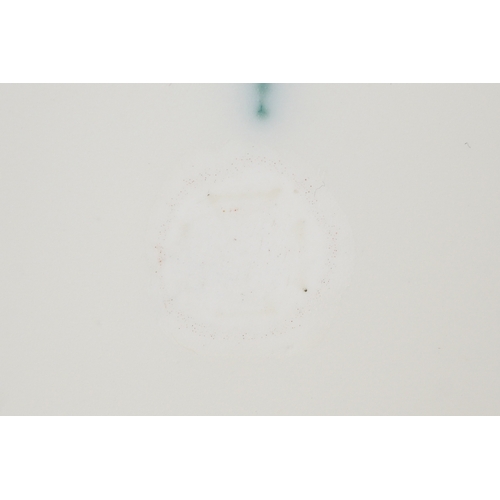  A 19th century Berlin porcelain cabinet cup and saucer hand painted with floral decoration, bearing ... 