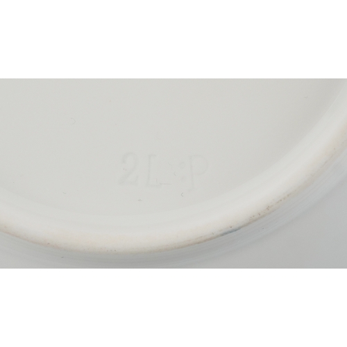  A 19th century Berlin porcelain cabinet cup and saucer hand painted with floral decoration, bearing ... 