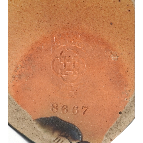  A Royal Doulton Lambeth stoneware dish modelled as a perched owl, impressed marks to the base, numbe... 