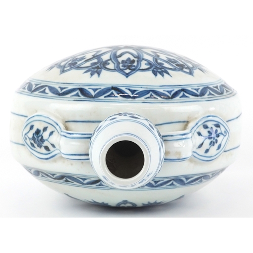 165 - A Chinese blue and white porcelain rosette moon flask hand painted with central stylized flower head... 
