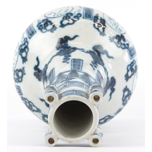 121 - A Chinese blue and white porcelain bottleneck vase with ears hand painted with pseudo Arabic script ... 