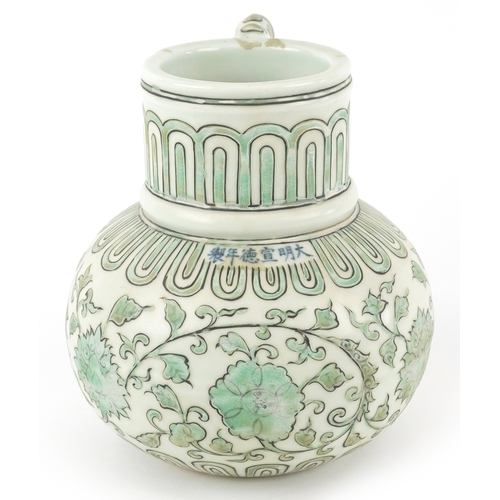 164 - A Chinese porcelain ewer with fish handle, hand painted with flower heads and scrolling vines, six f... 