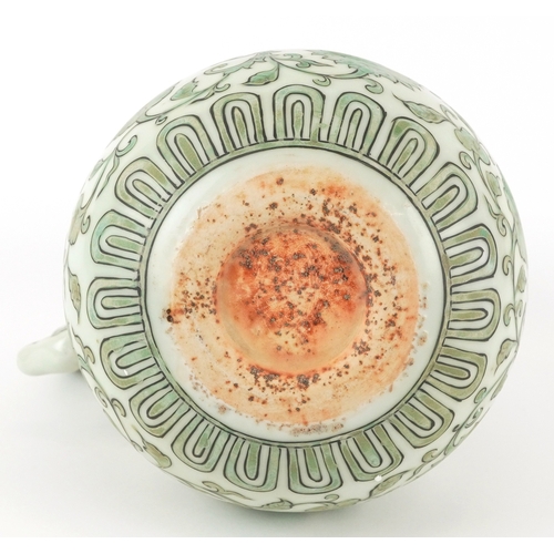 164 - A Chinese porcelain ewer with fish handle, hand painted with flower heads and scrolling vines, six f... 