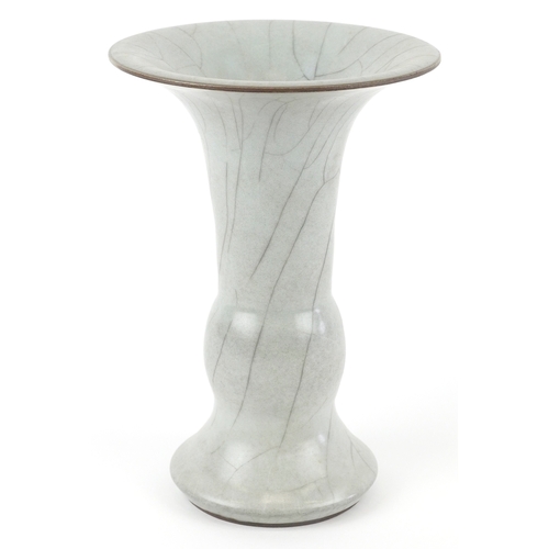 166 - A Chinese porcelain Gu beaker vase having a crackle glaze, 19cm high.
