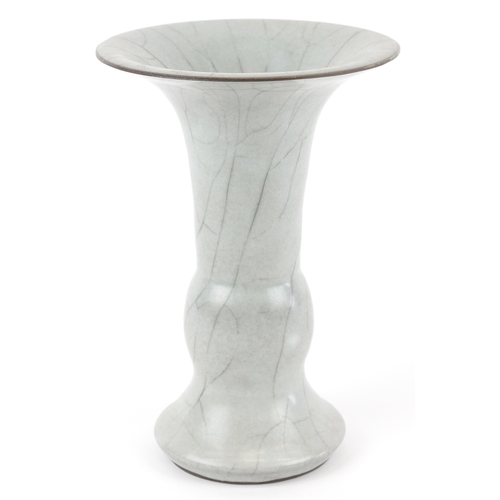 166 - A Chinese porcelain Gu beaker vase having a crackle glaze, 19cm high.
