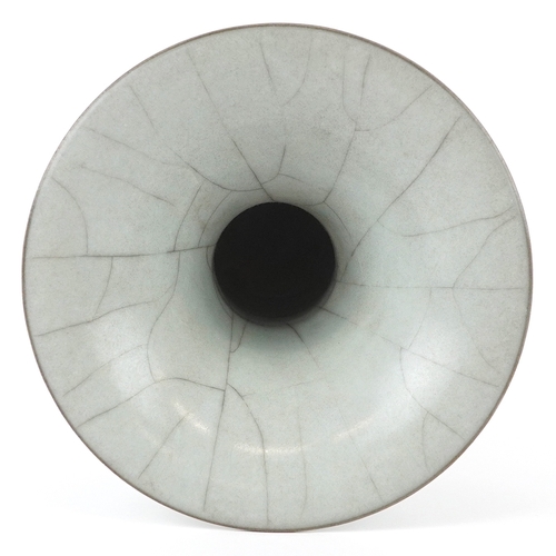 166 - A Chinese porcelain Gu beaker vase having a crackle glaze, 19cm high.