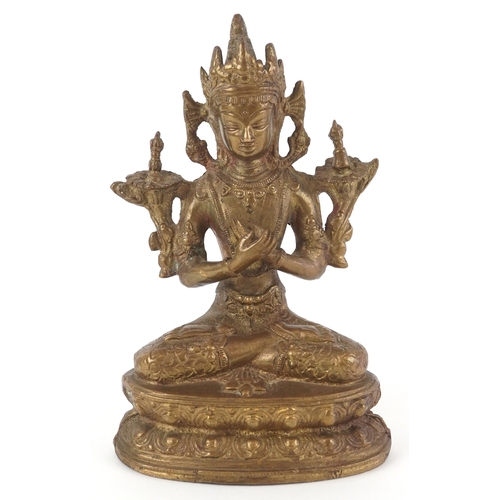 170 - A Chino Tibetan gilt bronze figure of a Buddha, 18cm high.