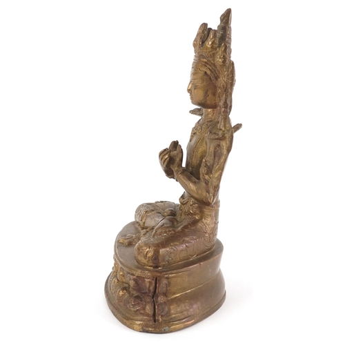 170 - A Chino Tibetan gilt bronze figure of a Buddha, 18cm high.