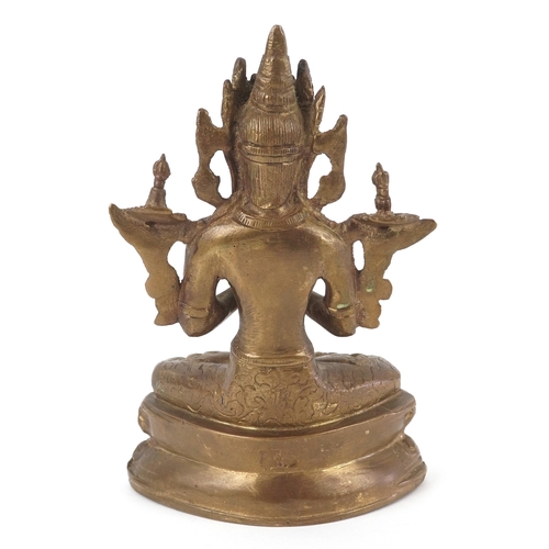 170 - A Chino Tibetan gilt bronze figure of a Buddha, 18cm high.