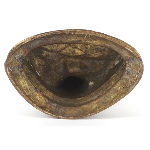 170 - A Chino Tibetan gilt bronze figure of a Buddha, 18cm high.