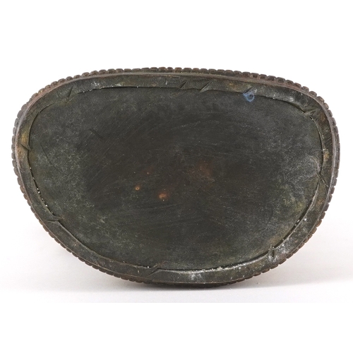 133 - A Chino Tibetan gilt bronze figure of a seated Buddha, 18cm high.