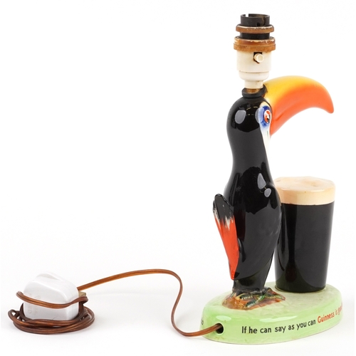 345 - A Carlton Ware Guinness advertising table lamp, 'How Grand to be a Toucan, Just Think What a Toucan ... 