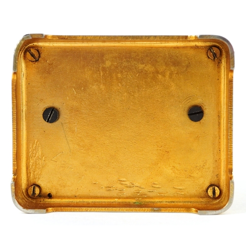 156 - A brass cased carriage clock having bevelled glass with enamelled dial and Roman numerals, 11cm high... 