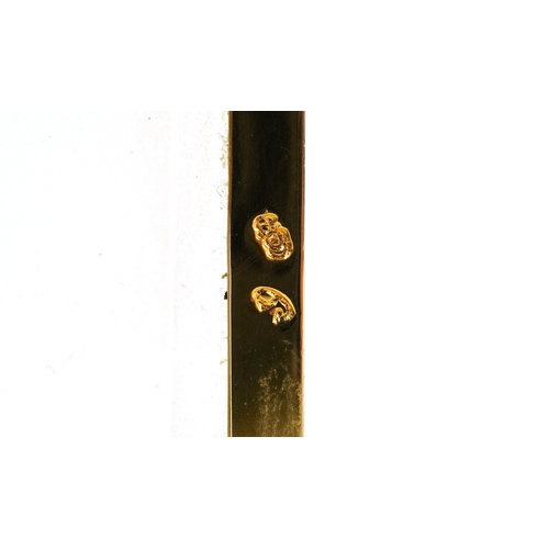 156 - A brass cased carriage clock having bevelled glass with enamelled dial and Roman numerals, 11cm high... 